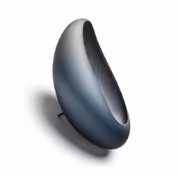 a small round metal object with black and gray surfaces