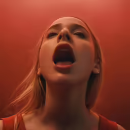 woman making a creepy face with her mouth open