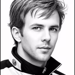 a man is posing for a portrait in black and white