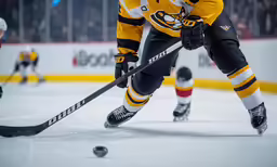 this is a man playing hockey on the ice