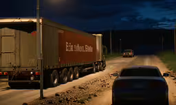 a truck carrying cars on the road in front of other traffic,a truck carrying a trailer down a road with two cars parked along the side