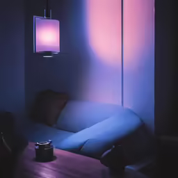a living room with a couch and some pillows