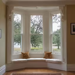 a round bay window in a corner of a room