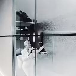an artistic photo taken through a glass window