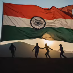 some people with a big flag that has the india tricolore on it