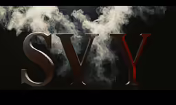 smoke rising over the letters of an english alphabet