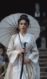 woman in traditional garb holding an umbrella while walking on steps