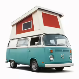 a blue and white vw bus with a house on it