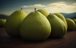 green pears sitting side by side on the ground
