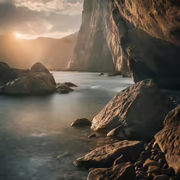 a rock ledge near the water with some rocks in the middle
