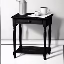 a black and white photo of an end table