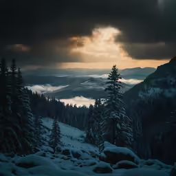 sun rays through dark clouds and clouds in the mountains