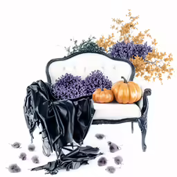 pumpkins and flowers on an old white chair