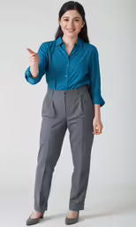 a woman posing for a picture and pointing