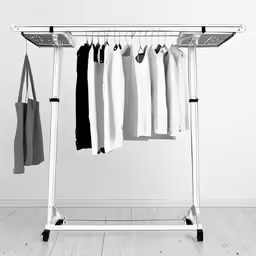 white clothing drying on an ironing board