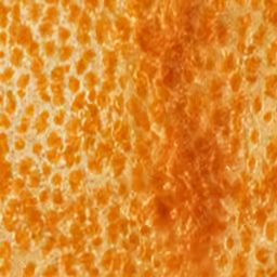 closeup view of orange and yellow substance on glass