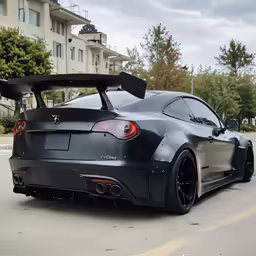 a very shiny black nissan zr1 sports car in traffic