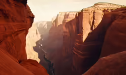 a canyon has many tall cliffs in it