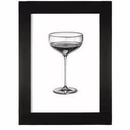 a small glass in black frame is next to an object