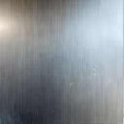 a black and white image of some metal
