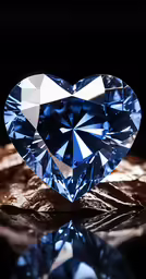 a heart shaped cut in the shape of a blue diamond