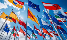 a group of flags that are flying in the sky