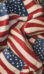 a pile of american flags sits on the ground