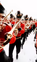 a group of men in marching outfits playing brass instruments