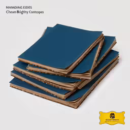 four notebooks stacked on top of each other