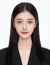 an asian woman is wearing black clothing and is facing the camera,an asian female wearing a black suit and white blouse