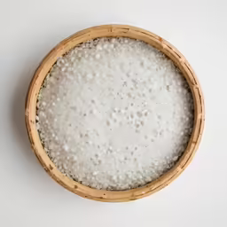 a bowl filled with lots of white liquid