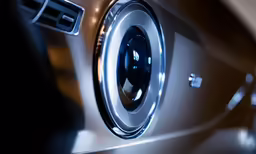 a black front view mirror on a silver car
