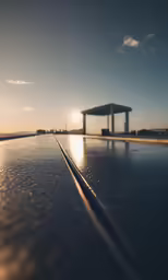 a pool is reflecting light on a clear day