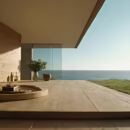 a wooden floor sitting next to an open room with large windows