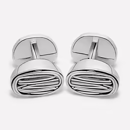 a pair of cuff rings that are designed in chrome steel