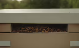 a pile of wood that is inside of a box
