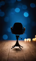 a chair in front of some blurry lights