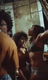 a group of sexy women looking down at one another