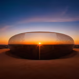 a large metal object on top of dirt