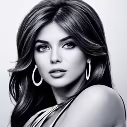 a beautiful lady in silver wearing large hoop earrings