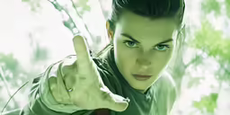 the woman is posing with her arm up and holding a knife