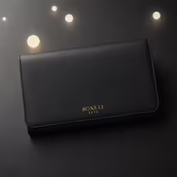 a black wallet on top of a table