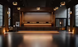 a big room with large windows and lights