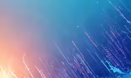 a blue and orange background with water droplets and spray