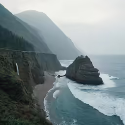there is a waterfall in the middle of this ocean
