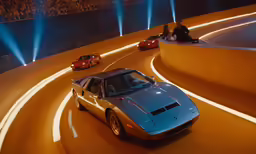 a sports car is driving on the road while people ride around