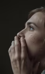 a beautiful blonde woman with frecks covering her face