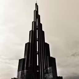 the skyscraper is made up of a very tall tower