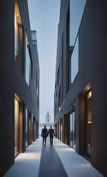 three people are walking in an area with tall buildings