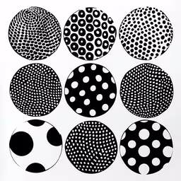 a group of nine black and white circles on a white background,various circles arranged in black and white on a paper